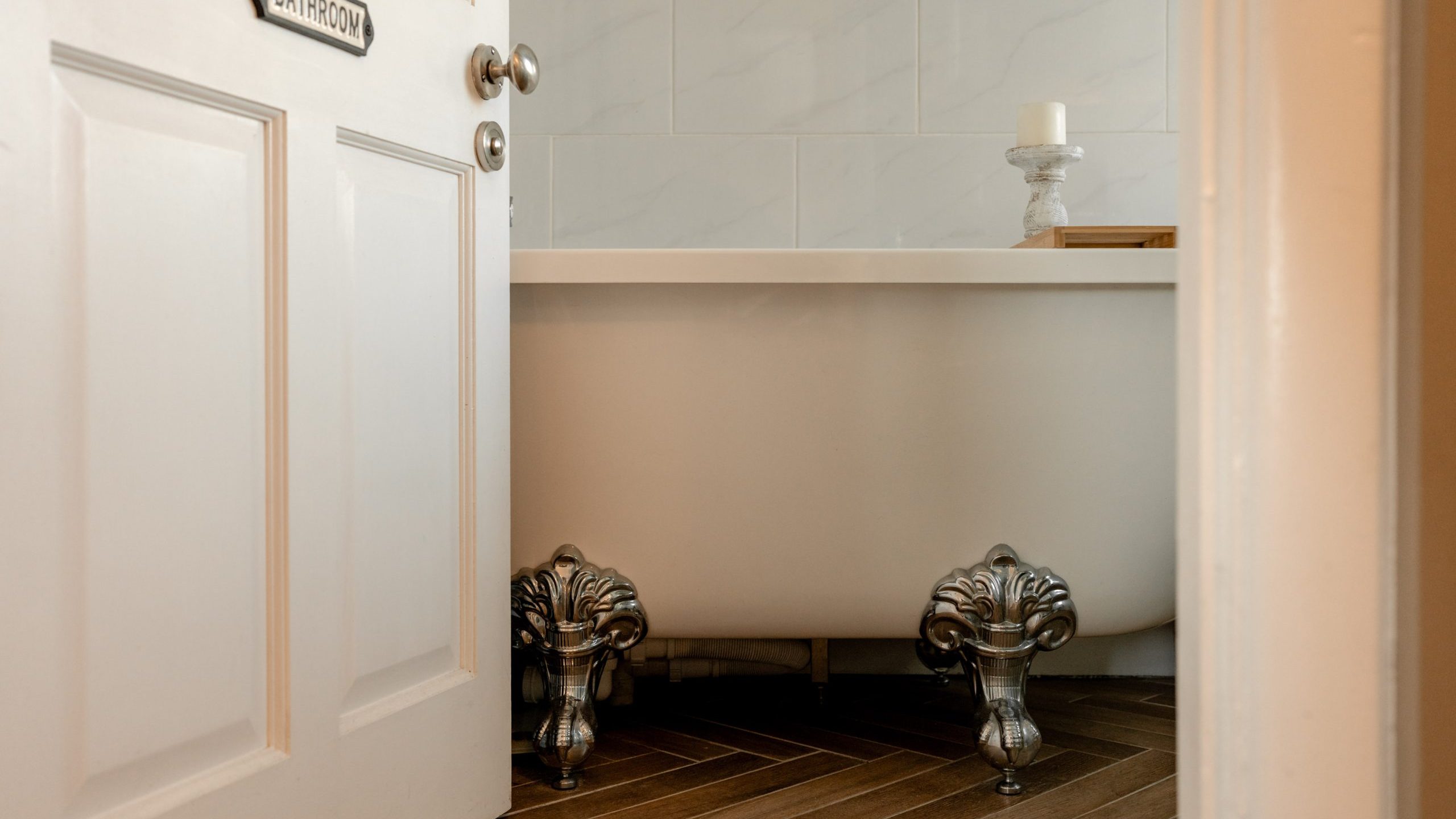 A partially open door with a